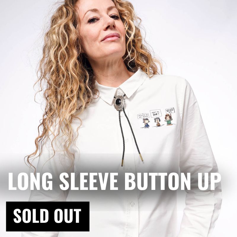 Person wearing white long sleeve button up from the Peanuts collaboration with text overlay that reads "Long Sleeve Button Up Sold Out"