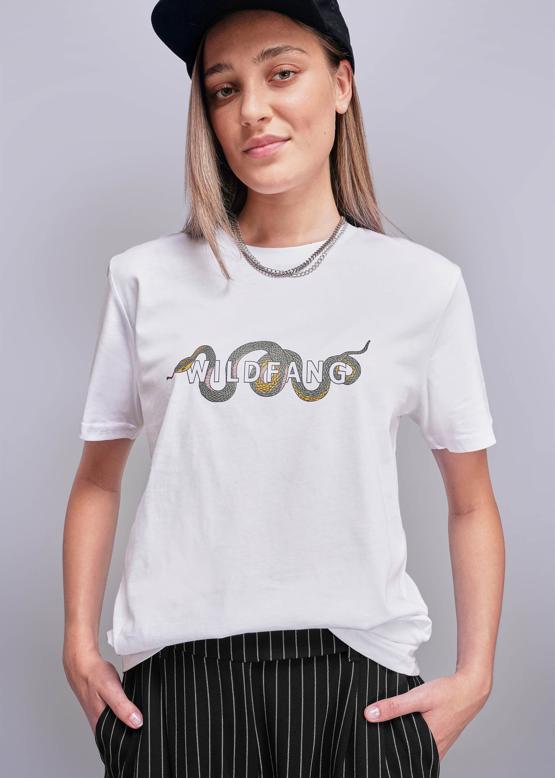 Person wearing a white t-shirt with 'WILDFANG' logo on a plain background