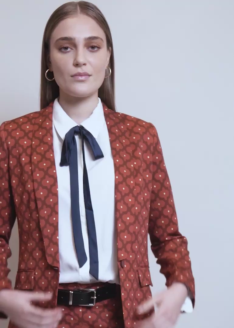 Model shows fit and features of The Empower Tux Blazer