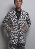 Model wearing The Empower Double Breasted Blazer in Monochrome Floral shows the fit and features of the blazer.
