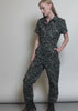 Video shows the High Waisted Short Sleeve Coverall on two models of different sizes. Shows on body and each unique feature of the product including adjustable tab waistband, stretch waistband, lots of real pockets at side, back and front, and soft stretch cotton material