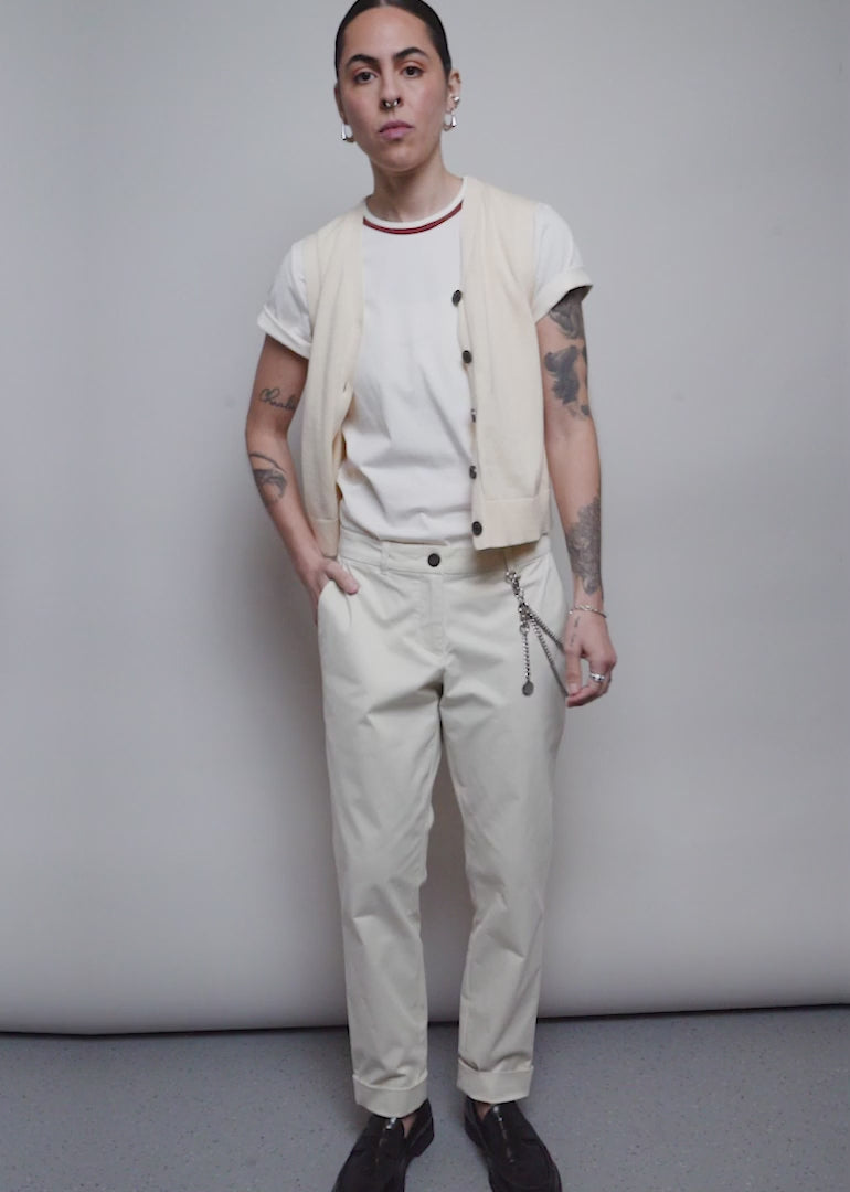 Model shows the fit and features of The Essential Trouser in Oat.