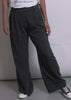 Two models of different sizes showcase the fit and features of The Empower Pinstripe Wide Leg Pant