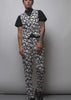 Model wearing The Empower Trouser in Monochrome Floral shows the fit and features of the pant.