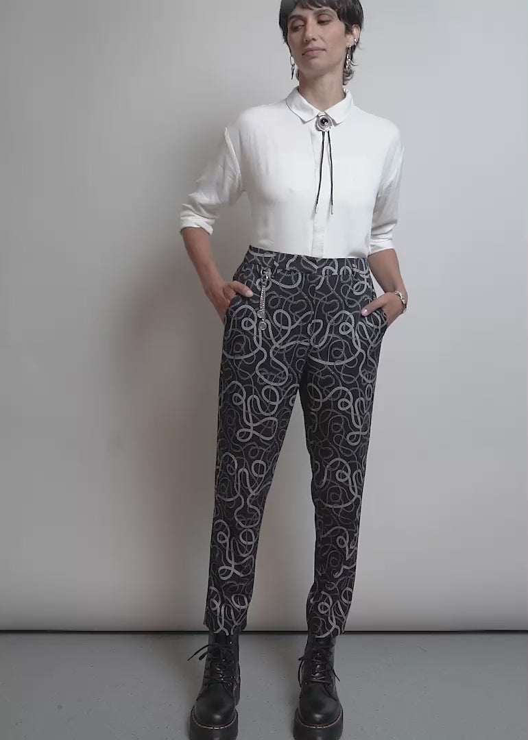 Model shows off the fit and features of the Debbie Harry x Wildfang Slim Crop Pant 